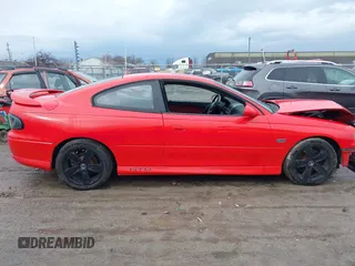 2004 Pontiac GTO with VIN 6G2VX12G34L221749, listed as a IAAI auction lot 41679612 with 1 mi miles. Bid and sale history available at carsss.com. Image 12.