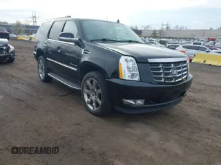 2011 Cadillac Escalade Luxury z VIN 1GYS4BEF3BR295593, wystawiony jako IAAI lot #41964910 z przebiegiem 111 444 mil mil oraz . Historia ofert i sprzedaży dostępna na DreamBid. Obrazek 1.