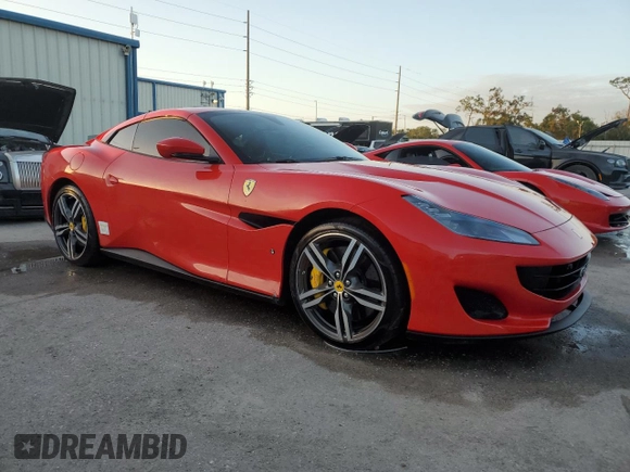 2019 Ferrari Portofino z VIN ZFF89FPA0K0242592, wystawiony jako Copart lot #74249014 z przebiegiem Nie podano mil oraz Nie do naprawy. Historia ofert i sprzedaży dostępna na DreamBid. Obrazek 4.