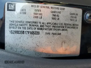 2007 Pontiac Solstice z VIN 1G2MB35B17Y105220, wystawiony jako Copart lot #52199785 z przebiegiem 348 414 mil mil oraz Czysty tytuł • Clean title. Historia ofert i sprzedaży dostępna na DreamBid. Obrazek 12.