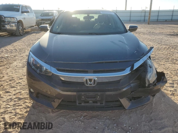 2018 Honda Civic EX-T z VIN JHMFC1F33JX033025, wystawiony jako Copart lot #46920555 z przebiegiem 100 673 mil mil oraz Szkoda całkowita • Salvage title. Historia ofert i sprzedaży dostępna na DreamBid. Obrazek 5.