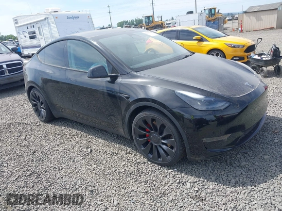 2022 Tesla Model Y Performance z VIN 7SAYGDEF5NF546680, wystawiony jako IAAI lot #42229359 z przebiegiem 55 597 mil mil oraz . Historia ofert i sprzedaży dostępna na DreamBid. Obrazek 1.