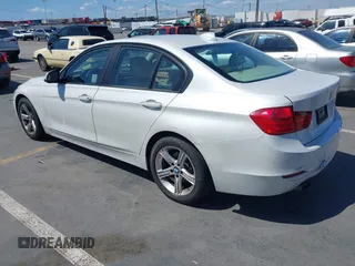 2013 BMW 3 Series 328i with VIN WBA3A5C51DF352812, listed as a IAAI auction lot 41974158 with 176,951 mi miles. Bid and sale history available at carsss.com. Image 3.