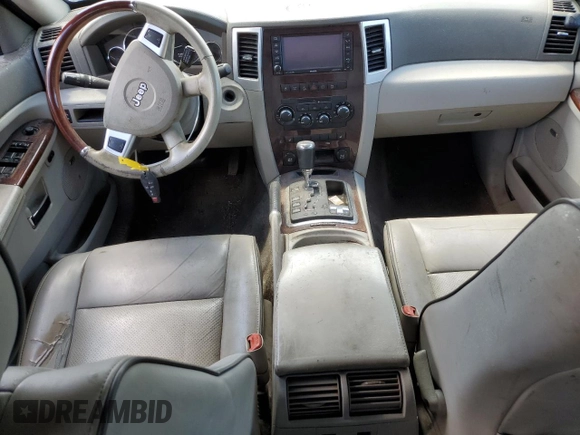 2009 Jeep Grand Cherokee with VIN 1J8HR68T29C512518, listed as a Copart auction lot 58894174 with 113,181 mi miles and Salvage title. Bid and sale history available at DreamBid. Image 8.