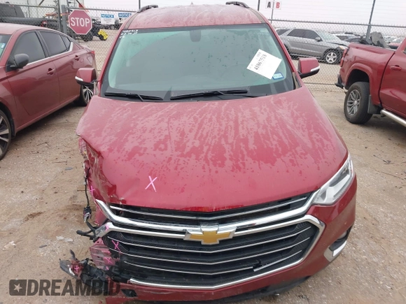 2020 Chevrolet Traverse LT with VIN 1GNERHKW0LJ264997, listed as a IAAI auction lot 41867518 with 36,717 mi miles and . Bid and sale history available at DreamBid. Image 12.