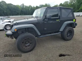 2013 Jeep Wrangler Sport with VIN 1C4AJWAG2DL520303, listed as a Copart auction lot 63137475 with 197,295 mi miles and Clean title. Bid and sale history available at DreamBid. Image 1.