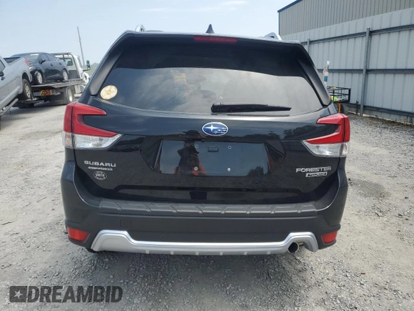 2024 Subaru Forester Touring with VIN JF2SKAMC4RH474711, listed as a Copart auction lot 59582405 with 5,373 mi miles and Salvage title. Bid and sale history available at DreamBid. Image 6.