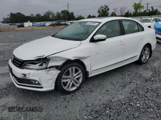 2017 Volkswagen Jetta SEL z VIN 3VWL17AJ5HM218502, wystawiony jako Copart lot #56638095 z przebiegiem 59 746 mil mil oraz Szkoda całkowita • Salvage title. Historia ofert i sprzedaży dostępna na DreamBid. Obrazek 1.