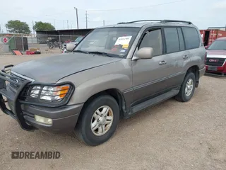 1999 Lexus LX 470 with VIN JT6HT00W8X0068157, listed as a IAAI auction lot 41955366 with 291,014 mi miles and . Bid and sale history available at DreamBid. Image 2.