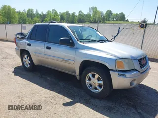 2004 GMC Envoy SLE z VIN 1GKDS13S242420100, wystawiony jako IAAI lot #41963800 z przebiegiem 341 395 mil mil oraz . Historia ofert i sprzedaży dostępna na DreamBid. Obrazek 1.