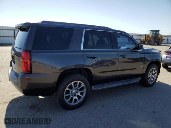 2015 Chevrolet Tahoe LT with VIN 1GNSCBKC5FR271151, listed as a Copart auction lot 55472165 with 159,915 mi miles and Salvage title. Bid and sale history available at DreamBid. Image 3.