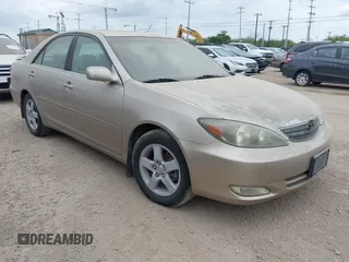 2002 Toyota Camry LE z VIN 4T1BE32K52U614799, wystawiony jako IAAI lot #42422888 z przebiegiem 192 893 mil mil oraz . Historia ofert i sprzedaży dostępna na DreamBid. Obrazek 1.