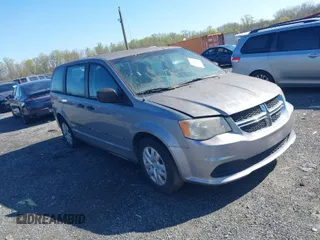 2014 Dodge Grand Caravan SE with VIN 2C4RDGBG4ER163293, listed as a IAAI auction lot 42042991 with 118,700 mi miles and . Bid and sale history available at DreamBid. Image 1.