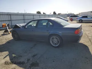 2000 BMW 7 Series 740iA with VIN WBAGG8341YDN80237, listed as a Copart auction lot 52212515 with 0 mi miles and Salvage Title. Bid and sale history available at carsss.com. Image 2.