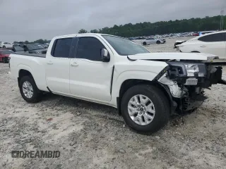 2024 Nissan Frontier SV with VIN 1N6ED1FJ1RN659511, listed as a Copart auction lot 57138225 with 21,933 mi miles and Salvage title. Bid and sale history available at DreamBid. Image 4.