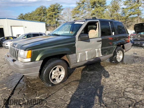 1996 Jeep Grand Cherokee with VIN 1J4EZ58S9TC148692, listed as a Copart auction lot 87730075 with Not provided miles and Salvage title. Bid and sale history available at DreamBid. Image 1.