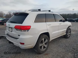 2015 Jeep Grand Cherokee High Altitude with VIN 1C4RJECG8FC175565, listed as a IAAI auction lot 41733248 with 107,947 mi miles. Bid and sale history available at carsss.com. Image 4.