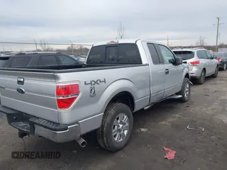 2014 Ford F-150 XL with VIN 1FTFX1ET3EFC39285, listed as a IAAI auction lot 41390024 with 217,856 mi miles. Bid and sale history available at carsss.com. Image 4.