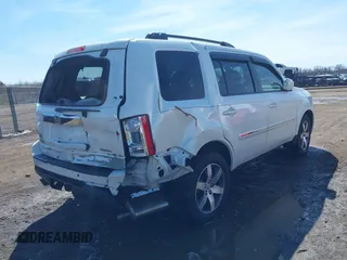 2013 Honda Pilot Touring with VIN 5FNYF3H9XDB006353, listed as a IAAI auction lot 41826557 with 174,552 mi miles and . Bid and sale history available at DreamBid. Image 4.