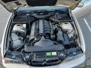 1998 BMW 5 Series 528iA with VIN WBADD6320WBW46302, listed as a Copart auction lot 45062025 with 42,667 mi miles and Salvage Title. Bid and sale history available at carsss.com. Image 7.