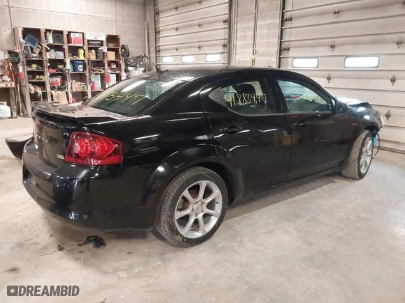 2011 Dodge Avenger Heat with VIN 1B3BD1FG6BN543920, listed as a IAAI auction lot 41883447 with 133,481 mi miles. Bid and sale history available at carsss.com. Image 4.