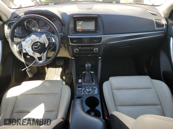 2016 Mazda CX-5 Grand Touring with VIN JM3KE4DY8G0728765, listed as a Copart auction lot 51625825 with 141,681 mi miles and Salvage Title. Bid and sale history available at carsss.com. Image 8.