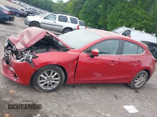 2014 Mazda 3 i Touring z VIN 3MZBM1L70EM112973, wystawiony jako IAAI lot #42077630 z przebiegiem 118 059 mil mil oraz . Historia ofert i sprzedaży dostępna na DreamBid. Obrazek 14.