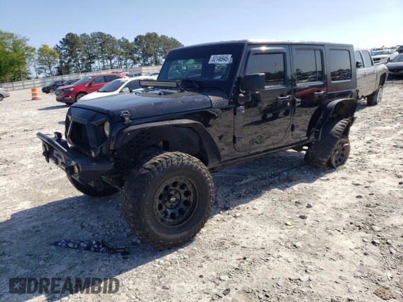 2013 Jeep Wrangler Unlimited Moab with VIN 1C4HJWEG7DL600043, listed as a Copart auction lot 52146945 with 118,882 mi miles and Salvage title. Bid and sale history available at DreamBid. Image 1.