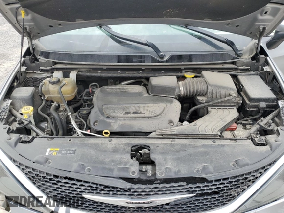 2021 Chrysler Voyager LXi with VIN 2C4RC1DG0MR521145, listed as a Copart auction lot 48062405 with 144,197 mi miles and Salvage Title. Bid and sale history available at DreamBid. Image 12.