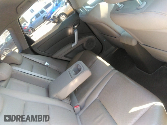 2007 Acura RDX Tech Pkg with VIN 5J8TB18527A009897, listed as a IAAI auction lot 41897761 with 113,769 mi miles. Bid and sale history available at carsss.com. Image 8.