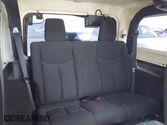 2014 Jeep Wrangler Sport with VIN 1C4AJWAGXEL177449, listed as a IAAI auction lot 41741519 with 117,056 mi miles and . Bid and sale history available at carsss.com. Image 8.