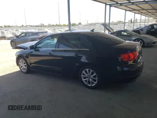 2014 Volkswagen Jetta SE with VIN 3VWD17AJXEM445488, listed as a Copart auction lot 65282425 with 159,356 mi miles and Salvage title. Bid and sale history available at DreamBid. Image 2.