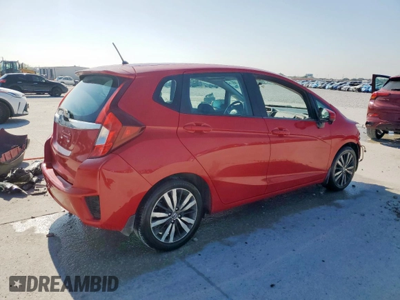 2015 Honda Fit EX-L with VIN 3HGGK5H87FM701089, listed as a Copart auction lot 54057335 with 88,423 mi miles and Salvage title. Bid and sale history available at DreamBid. Image 3.
