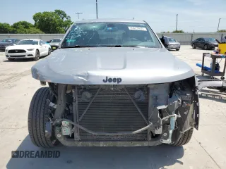 2018 Jeep Grand Cherokee Laredo with VIN 1C4RJFAG4JC272683, listed as a Copart auction lot 56823455 with 122,778 mi miles and Salvage title. Bid and sale history available at DreamBid. Image 5.