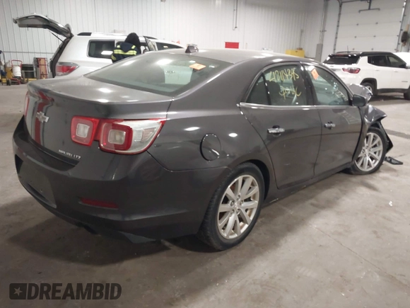 2013 Chevrolet Malibu LTZ with VIN 1G11H5SA1DF281933, listed as a IAAI auction lot 42114395 with 193,550 mi miles and . Bid and sale history available at DreamBid. Image 4.