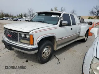 1989 GMC Sierra 1500 with VIN 2GTHC39K3K1532298, listed as a Copart auction lot 51497065 with 233,797 mi miles and Salvage Title. Bid and sale history available at DreamBid. Image 1.