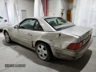 1999 Mercedes-Benz SL-Class with VIN WDBFA68F9XF172312, listed as a Copart auction lot 61248884 with 104,331 mi miles and Salvage Title. Bid and sale history available at carsss.com. Image 2.