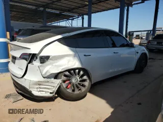 2021 Tesla Model Y Performance z VIN 5YJYGDEF5MF215870, wystawiony jako Copart lot #52531015 z przebiegiem 21 904 mil mil oraz Szkoda całkowita • Salvage title. Historia ofert i sprzedaży dostępna na DreamBid. Obrazek 3.