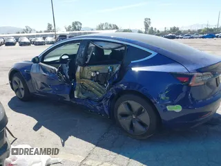 2020 Tesla Model 3 Standard Range Plus with VIN 5YJ3E1EA1LF590396, listed as a IAAI auction lot 41868089 with 51,278 mi miles. Bid and sale history available at carsss.com. Image 14.