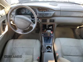 1997 Mazda Millenia S z VIN JM1TA2229V1307575, wystawiony jako Copart lot #87040954 z przebiegiem 160 513 mil mil oraz Szkody całkowita. Historia ofert i sprzedaży dostępna na DreamBid. Obrazek 8.