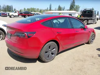 2023 Tesla Model 3 Long Range with VIN 5YJ3E1EBXPF603421, listed as a IAAI auction lot 42105037 with 13,186 mi miles and . Bid and sale history available at DreamBid. Image 4.
