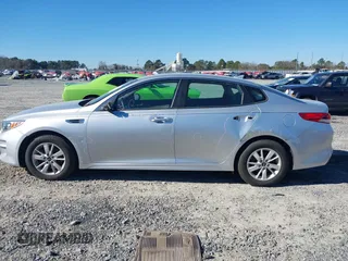 2016 Kia Optima LX with VIN 5XXGT4L37GG015462, listed as a IAAI auction lot 41247091 with 165,755 mi miles and . Bid and sale history available at DreamBid. Image 14.