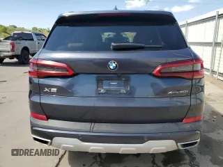 2020 BMW X5 xDrive40i with VIN 5UXCR6C06LLL75359, listed as a Copart auction lot 60897885 with 66,631 mi miles and Salvage title. Bid and sale history available at DreamBid. Image 6.