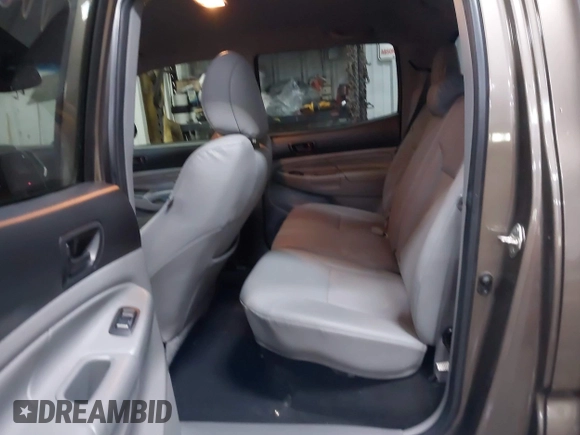 2014 Toyota Tacoma PreRunner with VIN 3TMJU4GNXEM164507, listed as a IAAI auction lot 42118984 with 183,101 mi miles and . Bid and sale history available at DreamBid. Image 8.