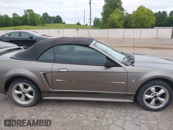 2001 Ford Mustang Deluxe z VIN 1FAFP44411F159656, wystawiony jako IAAI lot #42123128 z przebiegiem 191 814 mil mil oraz . Historia ofert i sprzedaży dostępna na DreamBid. Obrazek 14.