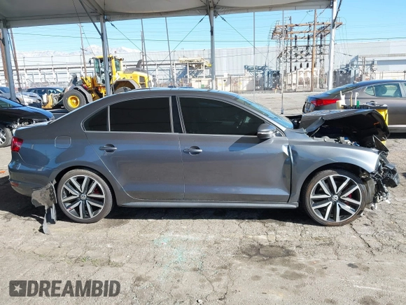 2012 Volkswagen Jetta GLI Autobahn with VIN 3VW4A7AJ5CM085902, listed as a IAAI auction lot 41830844 with 75,869 mi miles and . Bid and sale history available at DreamBid. Image 13.
