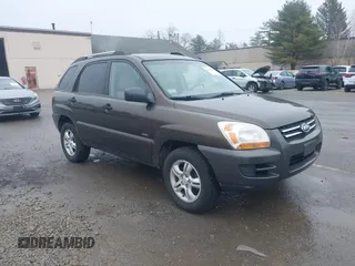 2006 Kia Sportage LX z VIN KNDJE723167218227, wystawiony jako IAAI lot #41930994 z przebiegiem 123 685 mil mil oraz . Historia ofert i sprzedaży dostępna na DreamBid. Obrazek 1.