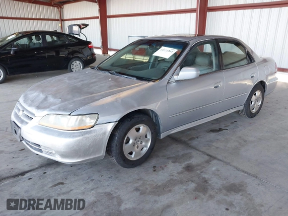 2001 Honda Accord EX z VIN 1HGCG16581A061367, wystawiony jako IAAI lot #41273264 z przebiegiem 294 003 mil mil oraz . Historia ofert i sprzedaży dostępna na DreamBid. Obrazek 2.