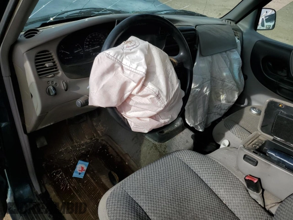 1998 Ford Ranger XL with VIN 1FTYR10C6WUC52233, listed as a Copart auction lot 56231925 with 198,687 mi miles and Salvage title. Bid and sale history available at DreamBid. Image 8.