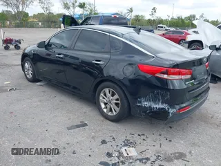 2016 Kia Optima LX with VIN 5XXGT4L31GG024240, listed as a IAAI auction lot 41727309 with 70,031 mi miles. Bid and sale history available at carsss.com. Image 3.